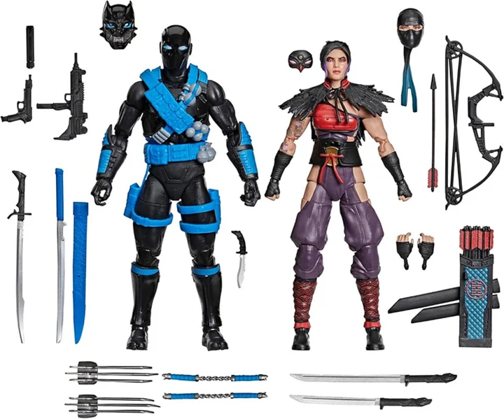 The contents of the Ninja Force two-pack laid out on white: both figures standing centre, with swords, claws, nunchaku, sidearms, a crossbow with arrows and quiver, two alternate heads, a raven mask, a ninja hood, a feather shawl and two spare hands arranged around them
