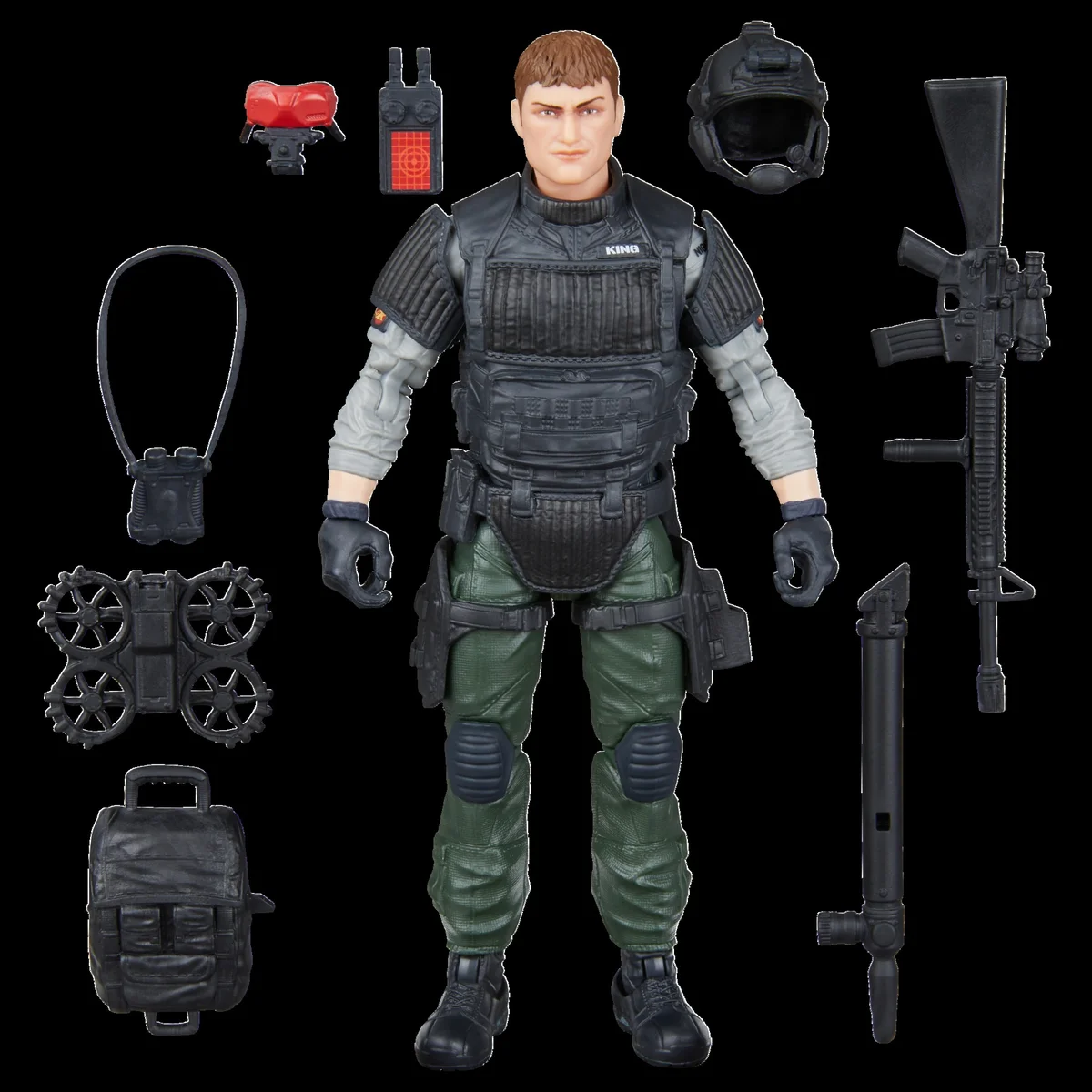 Hasbro's accessory layout for Classified Series 237 Night Force Sneak Peek, the figure centre with red night vision goggles, a handheld unit with an orange screen, a helmet, a binocular harness on a lanyard, a quad-rotor drone, a backpack, a rifle and a periscope arranged around him