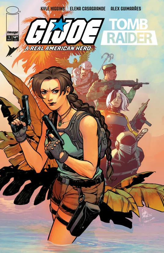 Elena Casagrande and Alex Guimaraes' cover A for the first printing: Lara Croft in the foreground with twin pistols and a long braid, Shipwreck in his white cap and two more Joes behind her, Snake-Eyes in his visor at lower right, palm fronds across the frame and a sunset sky over water