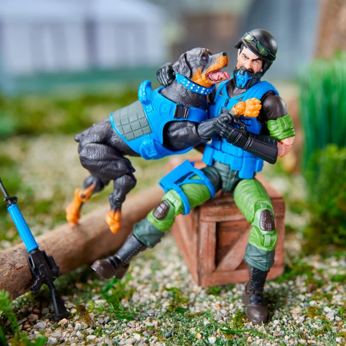 A Mad Marauders figure vaulting over a wooden crate with Junkyard on the ground below